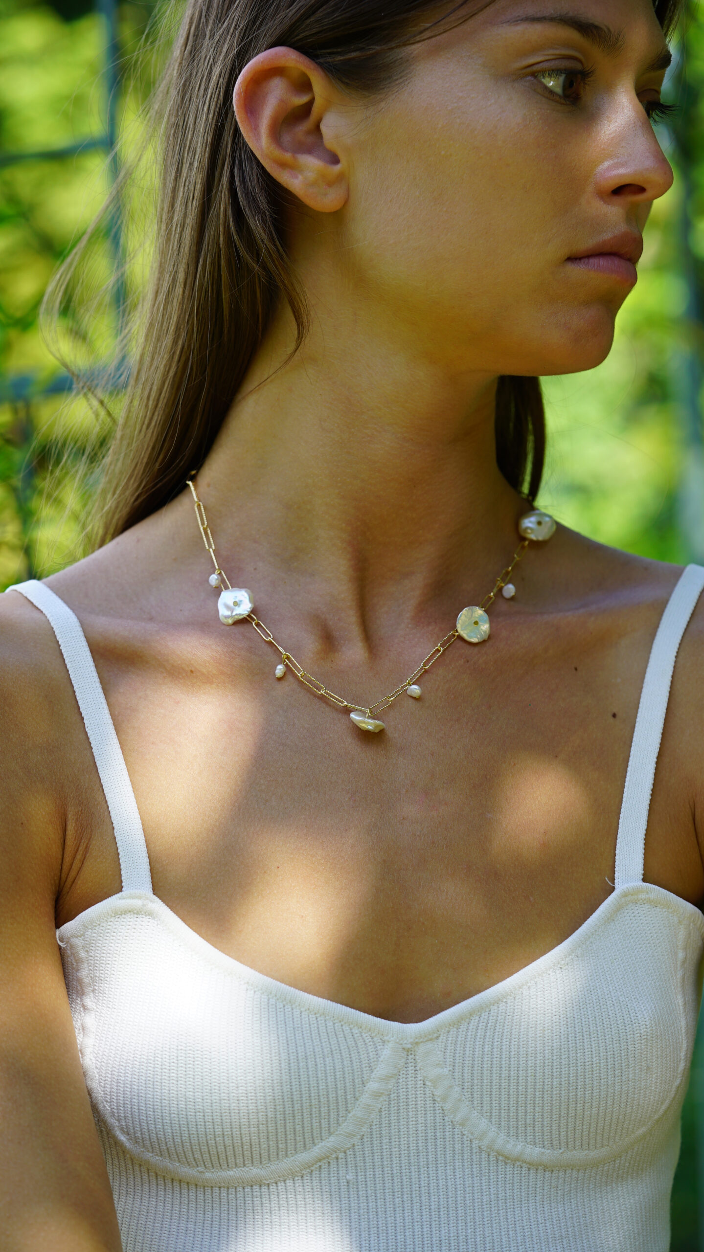 Flat cultured pearl necklace